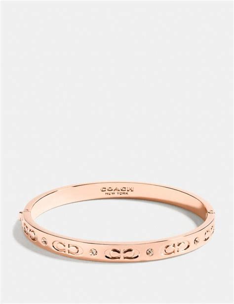 coach bangle bracelet price|coach kissing c hinged bangle.